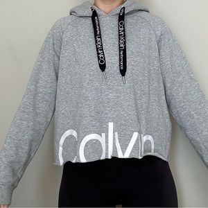 Calvin Klein, grey, cropped, woman’s hoodie. Size L.